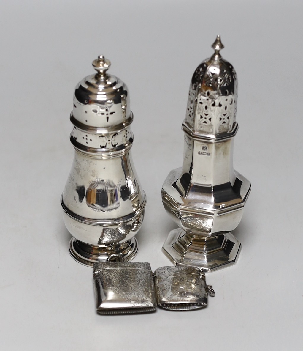 Two 20th century silver sugar casters, tallest 16.4cm and two early 20th century silver vesta cases.